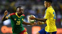 Cameroon's forward Karl Toko Ekambi (L) challenges Gabon's forward Denis Bouanga during the 2017 Africa Cup of Nations group A football match between Cameroon and Gabon at the Stade de l'Amitie Sino-Gabonaise in Libreville on January 22, 2017