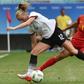 Tabea Kemme (left) of Germany clashes with China's Shuang Wang during their Rio 2016 Olympic women's quarter-final in Salvador, Brazil, on August 12, 2016