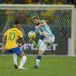 Brazil's Neymar and Argentina's Lionel Messi (right) vie for the ball during their 2018 FIFA World Cup qualifier match in Belo Horizonte, Brazil, on November 10, 2016
