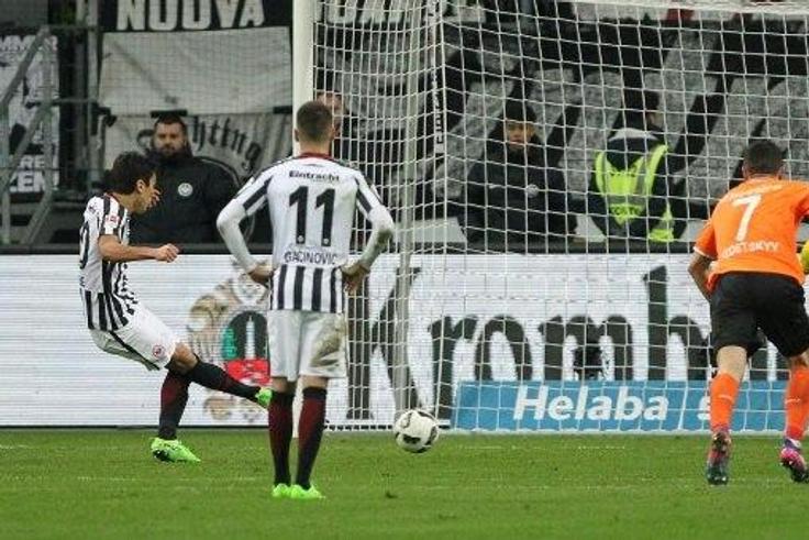 Frankfurt's Japanese midfielder Makoto Hasebe score the 1-0 penalty during the German first division Bundesliga football match Eintracht Frankfurt vs SV Darmstadt 98 in Frankfurt, Germany, on February 5, 2017