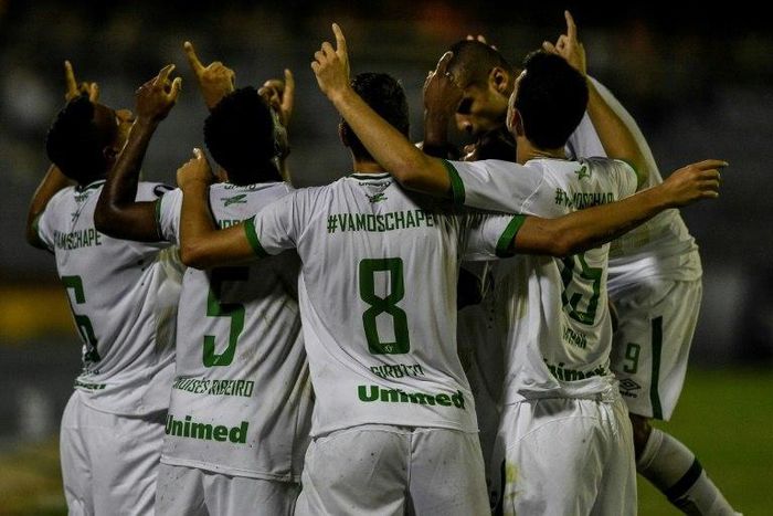 Chapecoense players celebrate after scoring a goal against Zulia during their Copa Libertadores match in Maracaibo, on March 7, 2017