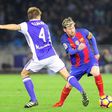 Real Sociedad's midfielder Asier Illarramendi (L) vies with Barcelona's Argentinian forward Lionel Messi during the Spanish league football match Real Sociedad vs FC Barcelona at the Anoeta stadium in San Sebastian, on November 27, 2016