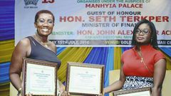 FROM LEFT: NANA EFUA ROCKSON (GROUP HEAD, CORPORATE AFFAIRS & MARKETING FOR GLICO GROUP) DISPLAYING THE AWARDS WITH JENNIFER SIRA DARTEH (BUSINESS DEVELOPMENT OFFICER FOR GLICO GENERAL) 
