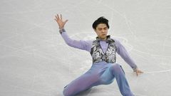 22-year-old Japanese Yuzuru Hanyu set world records for the short, free programme and overall score in 2015