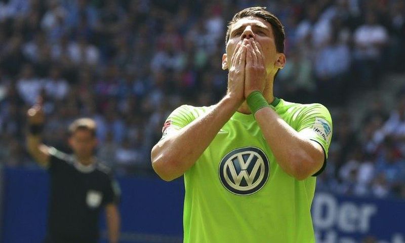 "Football is brutal," said Wolfsburg's forward Mario Gomez