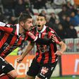 Nice's Mickael Le Bihan (L) celebrates after scoring against Montpellier HSC at the Allianz Riviera Stadium in Nice on February 24, 2017