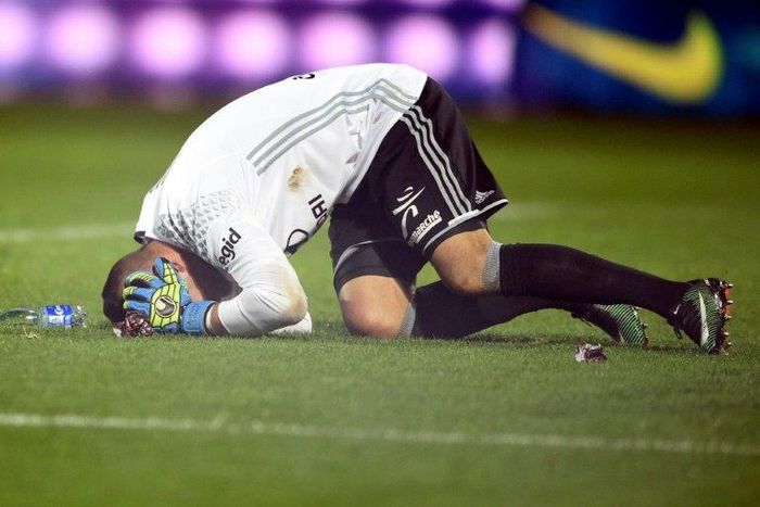Lyon's Portuguese goalkeeper Anthony Lopes reacting after a firecracker exploded beside him during the French L1 football match between Metz and Lyon on December 3, 2016 at Saint Symphorien stadium in Longeville-Les-Metz, eastern France