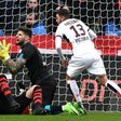 Nice's midfielder Valentin Eysseric (R) reacts after scoring in front of Rennes' goalkeeper Benoit Costil (C) on February 12, 2017