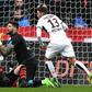 Nice's midfielder Valentin Eysseric (R) reacts after scoring in front of Rennes' goalkeeper Benoit Costil (C) on February 12, 2017