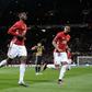 Manchester United's French midfielder Paul Pogba (C) celebrates scoring their first goal from the penalty spot against Fenerbahce at Old Trafford in Manchester, north west England, on October 20, 2016
