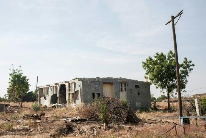 A picture taken on December 8, 2016 in Bama, northeast Nigeria shows one the buildings destoyed by Boko Haram