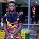 A Plus in a kente dress