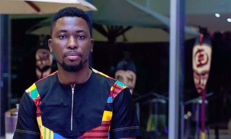 A Plus in a kente dress
