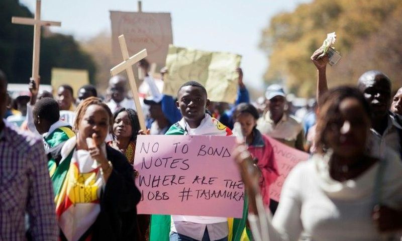 Zimabweans protest the introduction of new bond notes and youth unemployement on August, 3, 2016 in Harare