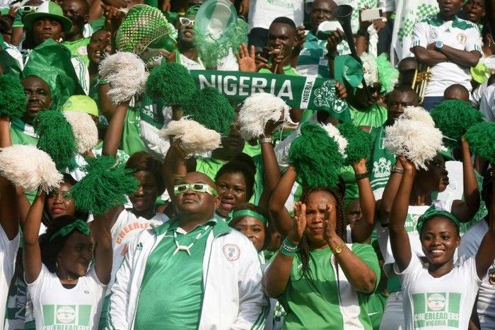 Nigerian fans cheer for their team in November 2016