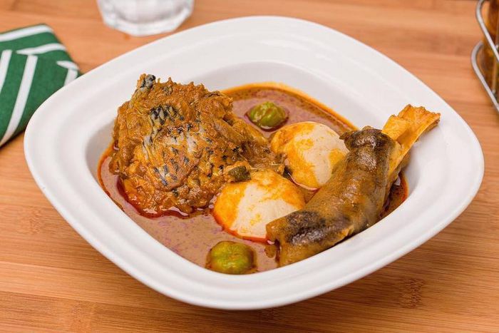 Banku and palm nut soup