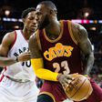 LeBron James of the Cleveland Cavaliers fights for position with Toronto's DeMar DeRozan on November 15, 2016