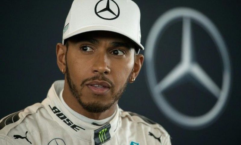 Mercedes driver Lewis Hamilton speaks during a launch event at the Silverstone circuit near Towcester, central England, on February 23, 2017