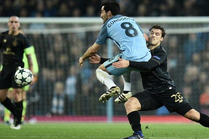 Celtic's Danish defender Erik Sviatchenko (R) has been the rock of Celtic's defence this season