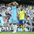 Manchester City's Argentinian striker Sergio Aguero reacts after missing a penalty during the English Premier League football match between Manchester City and Everton