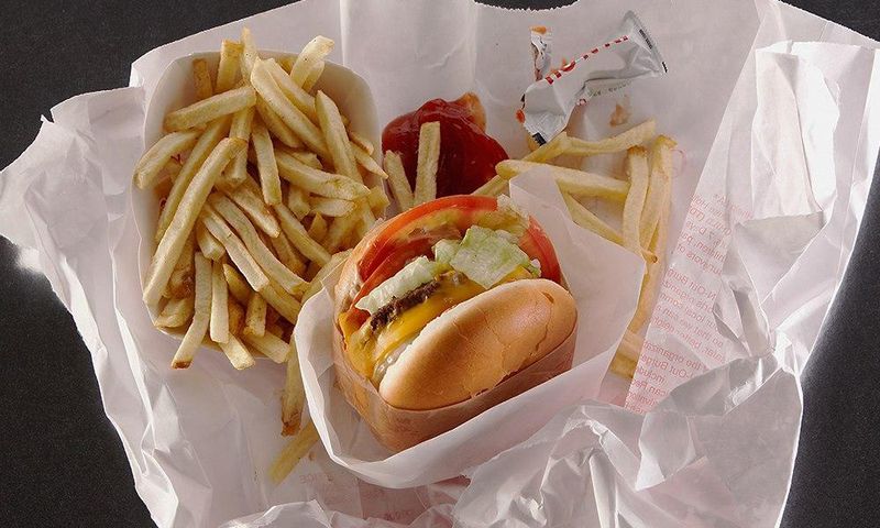 Harmful chemicals from food wrappers may build up in vital organs.