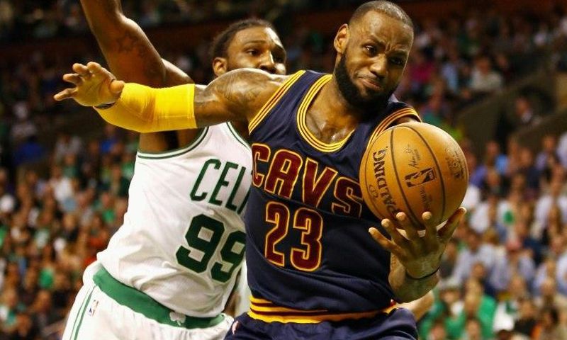 LeBron James of the Cleveland Cavaliers fights off a challenge from Jae Crowder of the Boston Celtics on May 19, 2017 in Boston, Massachusetts
