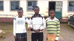Kokih Emmanuel and his sisters.