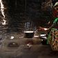 African woman in a hut
