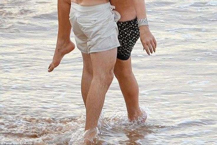 Mariah Carey and Bryan Tanaka kissing in Hawaii