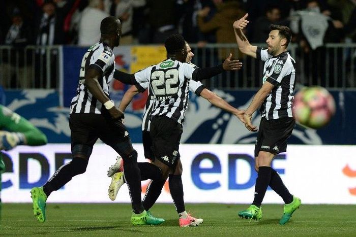 Angers' French midfielder Thomas Mangani (R) celebrates after scoring during the French Cup semi-final football match between Angers and Guingamp on April 25, 2017