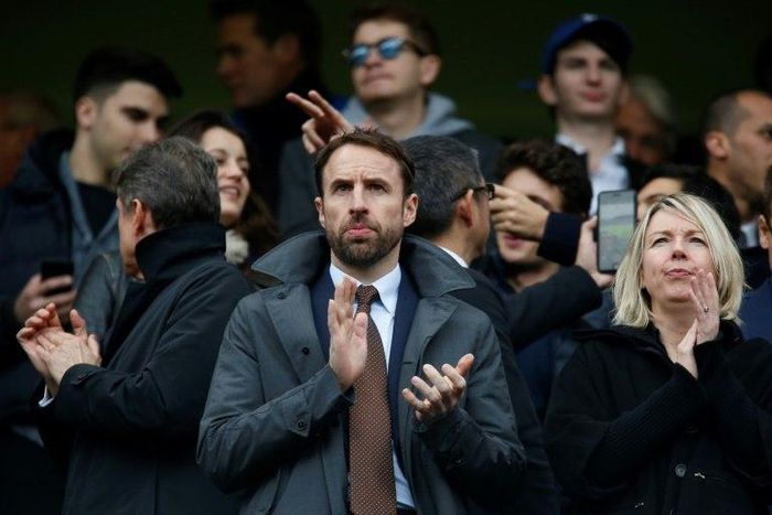 England manager Gareth Southgate (C) attends the English Premier League football match between Chelsea and Arsenal, at Stamford Bridge in London, on February 4, 2017
