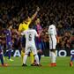 German referee Deniz Aytekin (C) shows a yellow card to Paris Saint-Germain's midfielder Blaise Matuidi (2ndR) during their UEFA Champions League round of 16 second leg football match at the Camp Nou stadium in Barcelona on March 8, 2017