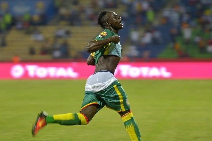Senegal's forward Sadio Mane celebrates after scoring a goal during the 2017 Africa Cup of Nations group B football match between Tunisia and Senegal in Franceville on January 15, 2017