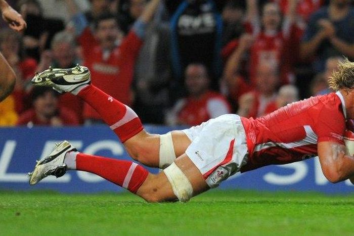 Wales' Andy Powell scores a try during the World Cup Rugby Union warm up match between Wales and Argentina on August 20, 2011
