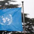 A United Nations flag flies outside the the European headquarters of the United Nations ahead of new round of meetings for the Syria talks in Geneva, Switzerland, March 16, 2016.