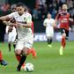 Monaco's forward Radamel Falcao (R) outruns Guingamp's midfielder Christophe Kerbrat during the French L1 football match February 25, 2017