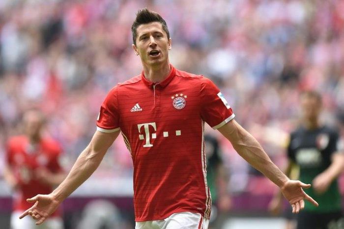 Bayern Munich's Robert Lewandowski celebrates after scoring a goal during their German first division Bundesliga match against Schalke 04, in Gelsenkirchen, on April 1, 2017