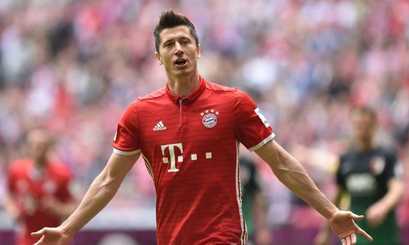 Bayern Munich's Robert Lewandowski celebrates after scoring a goal during their German first division Bundesliga match against Schalke 04, in Gelsenkirchen, on April 1, 2017