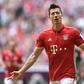 Bayern Munich's Robert Lewandowski celebrates after scoring a goal during their German first division Bundesliga match against Schalke 04, in Gelsenkirchen, on April 1, 2017