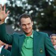 England's Danny Willett waves wearing the Green Jacket at the end of the 80th Masters Golf Tournament at the Augusta National Golf Club on April 10, 2016, in Augusta, Georgia