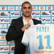 Dimitri Payet poses with his Marseille jersey during a press conference at the Robert-Louis Dreyfus Stadium in southern France, on January 30, 2017