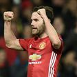 Manchester United's midfielder Juan Mata celebrates scoring the opening goal during the UEFA Europa League round of 16 second-leg football match against Rostov March 16, 2017