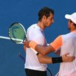 World number one Andy Murray (L) has been dumped out of the Australian Open in the fourth round by 50th-ranked Mischa Zverev (R)