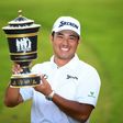 Hideki Matsuyama of Japan poses with the winner's trophy after the final round of the World Golf Championships-HSBC Champions tournament, in Shanghai, on October 30, 2016