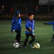 Boys attend a training session at a football club in Beijing