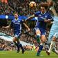 Chelsea's defender David Luiz (C) vies with Manchester City's striker Sergio Aguero (R) during the English Premier League football match between Manchester City and Chelsea at the Etihad Stadium in Manchester, north west England, on December 3, 2016