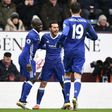 Chelsea's midfielder Pedro (2nd L) celebrates with teammates after scoring against Burnley on February 12, 2017