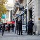 Police stand guard at the entrance of the luxury residence where US reality television star Kim Kardashian was robbed at gunpoint by assailants disguised as police, in Paris, in October 2016