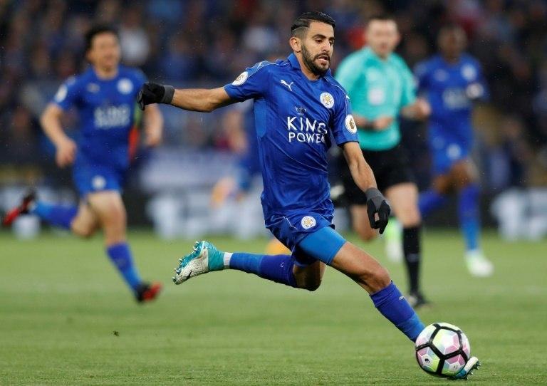 Leicester City's midfielder Riyad Mahrez runs with the ball during the English Premier League football match between Leicester City and Tottenham Hotspur at King Power Stadium in Leicester, central England on May 18, 2017