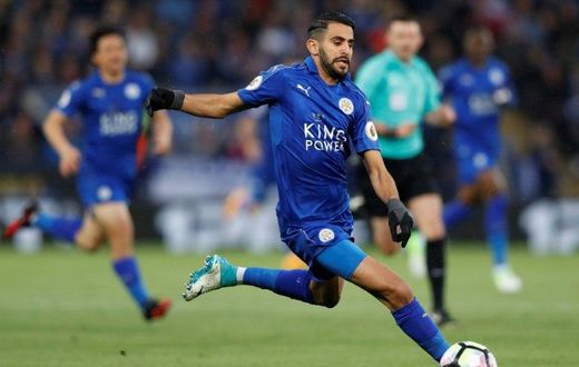 Leicester City's midfielder Riyad Mahrez runs with the ball during the English Premier League football match between Leicester City and Tottenham Hotspur at King Power Stadium in Leicester, central England on May 18, 2017